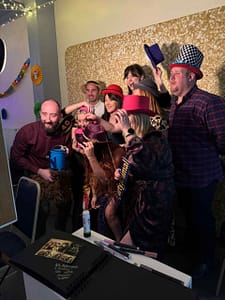 Vintage Selfie Pod. Group of friends posing with props